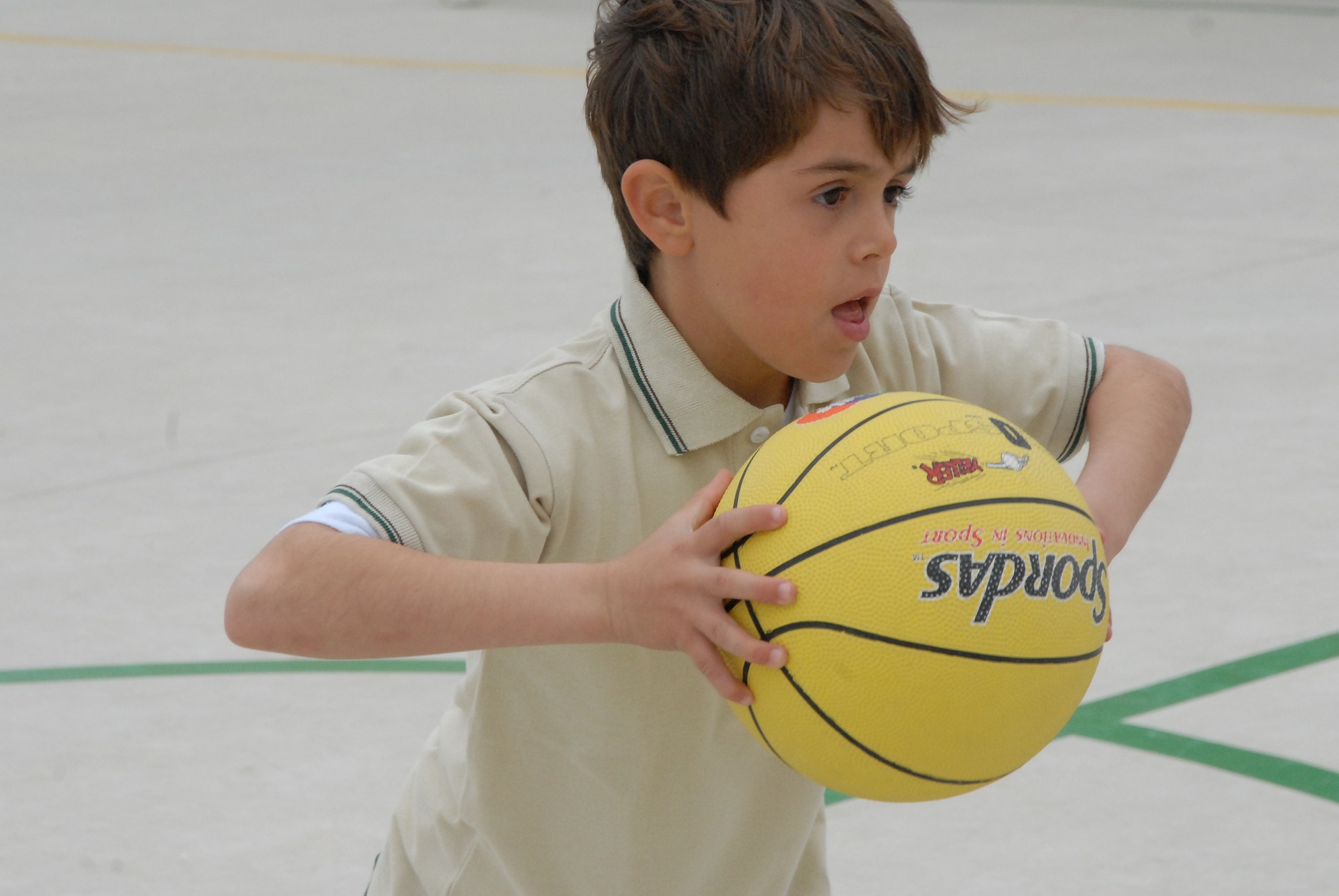 kid holding a basketball