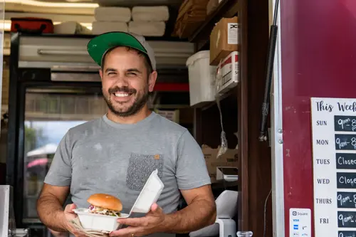 food truck owner smiling