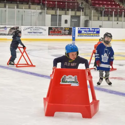 young child ice skating